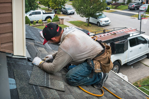 Professional Storm Damage Roof Repair technician working in Burlington, MA